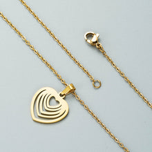 Cargar imagen en el visor de la galería, COLLAR + ARETES ACERO INOXIDABLE DORADO MULTICORAZONES ACERO INOXIDABLE
